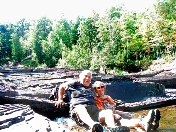 The two RV Gypsies cooling in Manido Falls